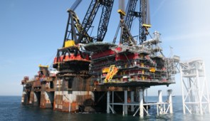 Installs large, heavy constructions for the oil and gas industry at sea such as production platforms and pipelines